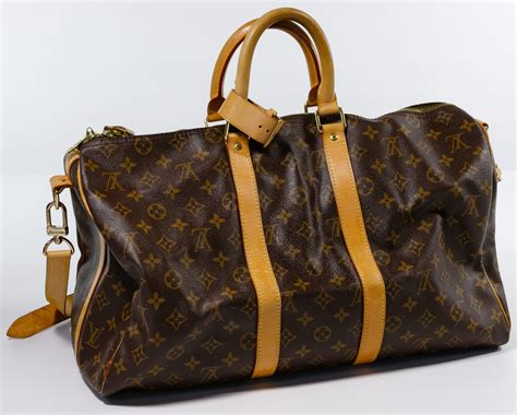 louis vuitton womens duffle bag|More.